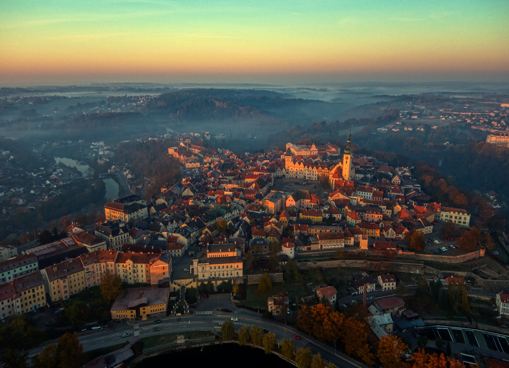 Aerial view of Tabor czech republic, lake and church tower winter morning sunlight