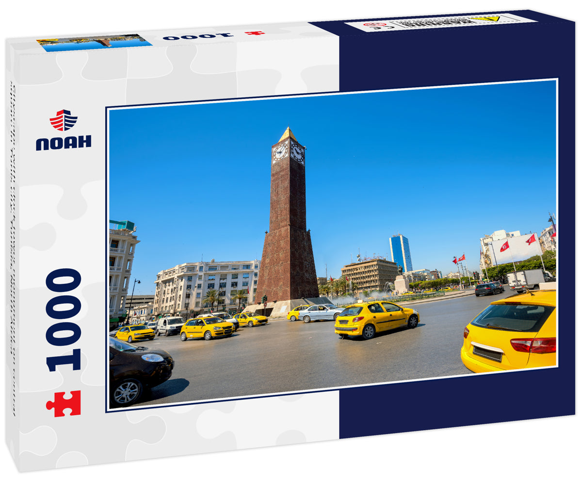 Cityscape with clock tower monument on central square in Tunis city. Tunisia, North Africa