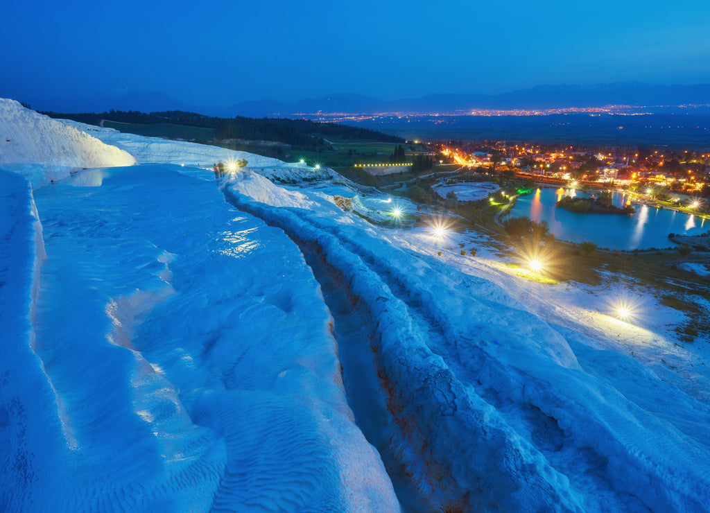 Pamukkale - amazing natural site with white terraces of travertine in Denizli Province, Turkey