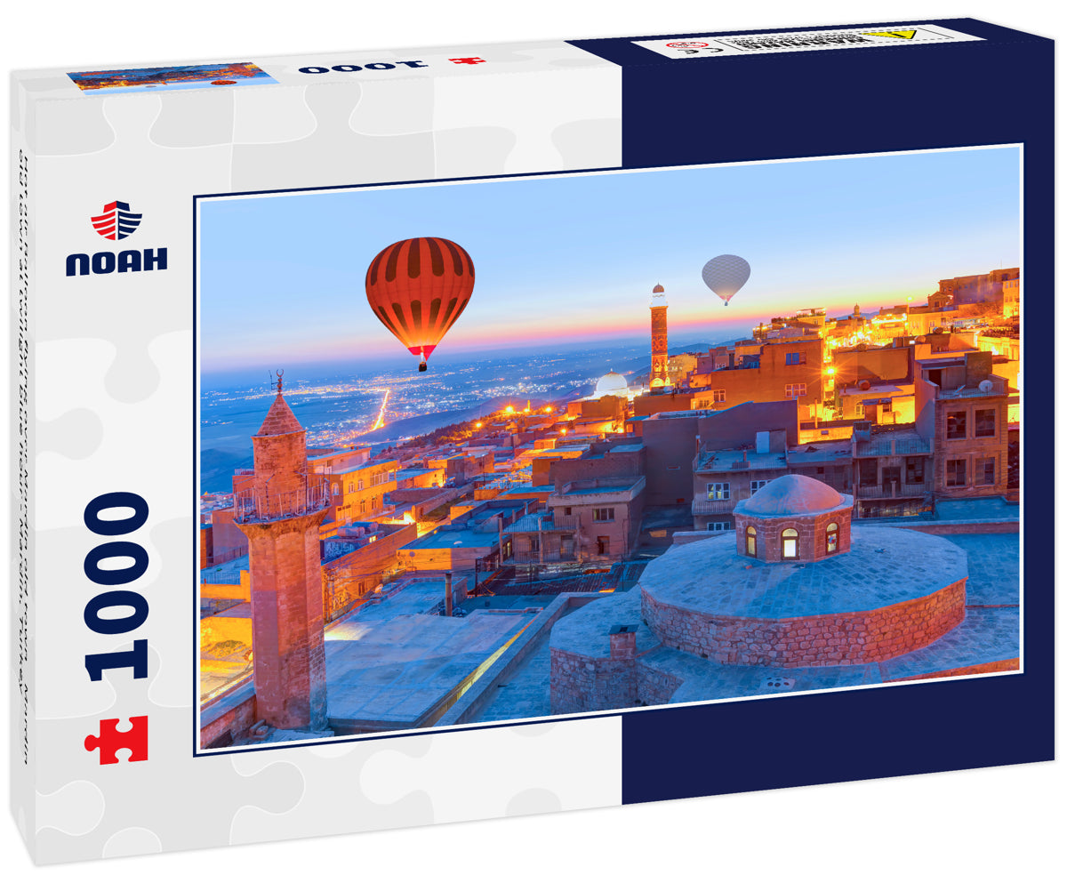 Hot air Balloon flying over Mardin old town - Mardin old town at twilight blue hour - Mardin, Turkey