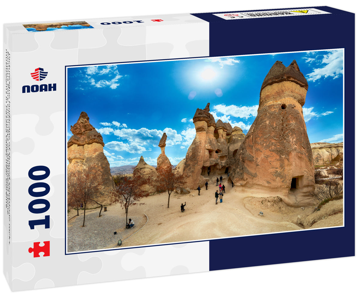 Picturesque landscape of shaped sandstone rocks. Famous Fairy Chimneys or Multihead stone mushrooms in Pasaba Valley near Goreme