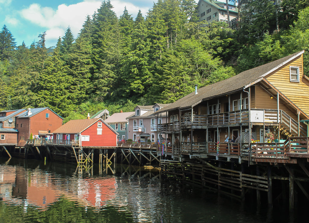 Suspended houses above a small river from Skagway, Alaska