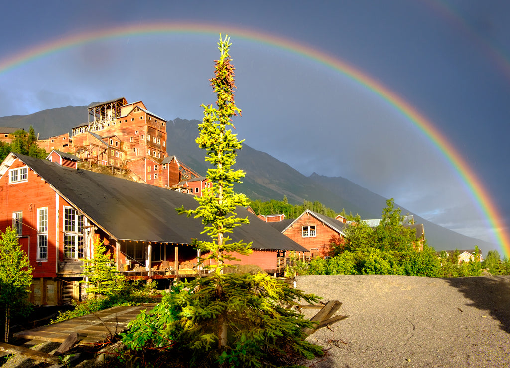 Rainbow over national landmark. Kennicott Mine. Alaska