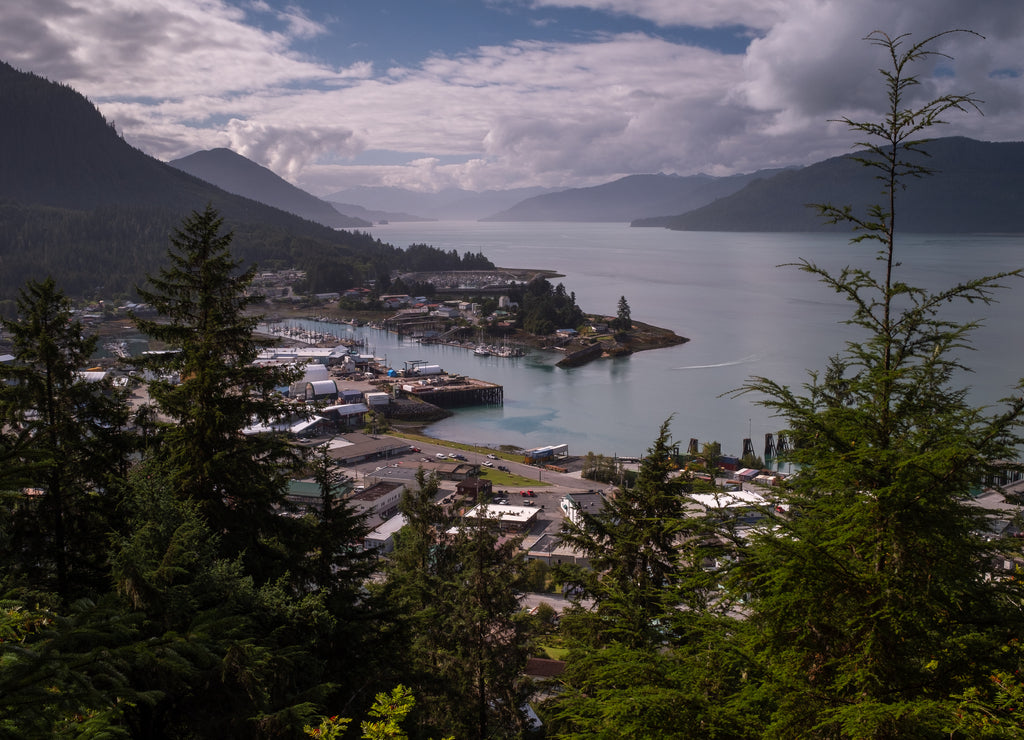 A view from the top of Mt Dewey of the remote township of Wrangell in Alaska, long exposure to smooth out the ocean, blue sky