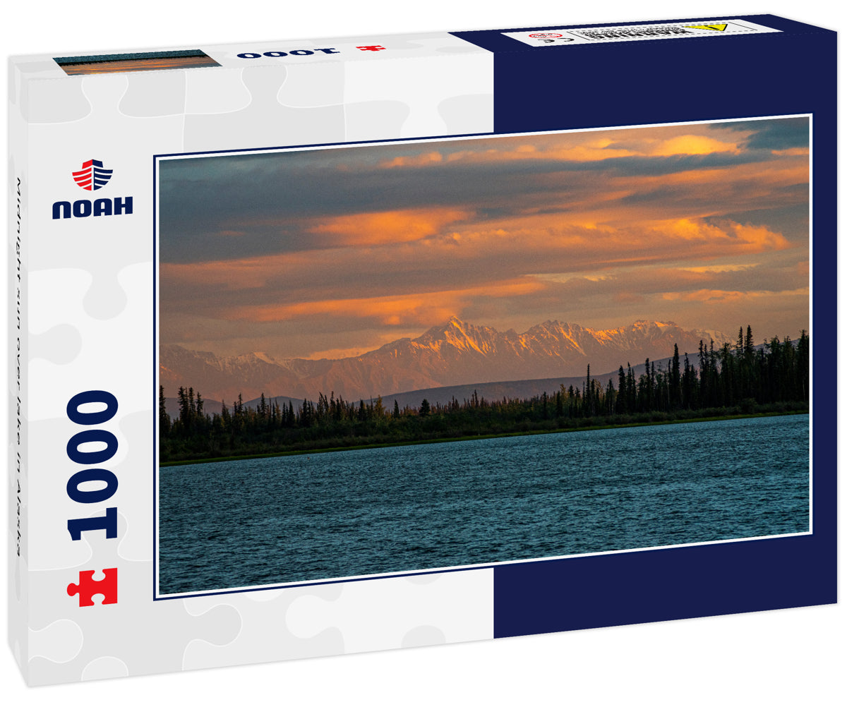 Midnight sun over lake in Alaska