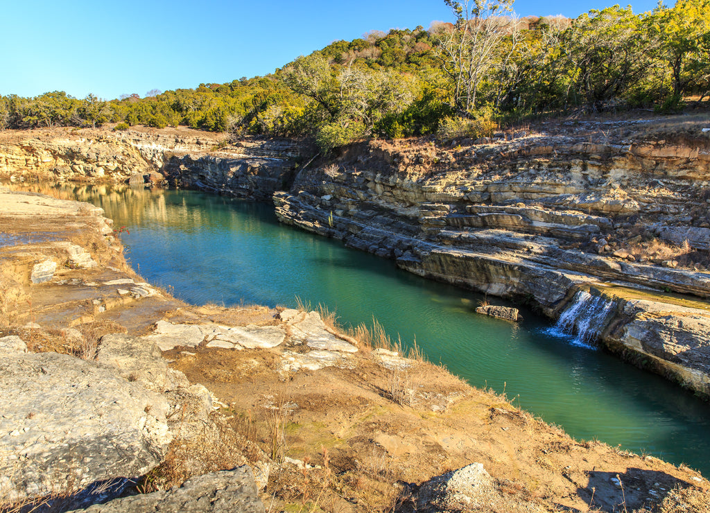 Canyon Lake Gorge formed in 2002 after many inches of rain fell and washed out the land. Just outside of New Branfels, Texas the gorge has uncovered dinosaur tracks, fossils, interesting geologically