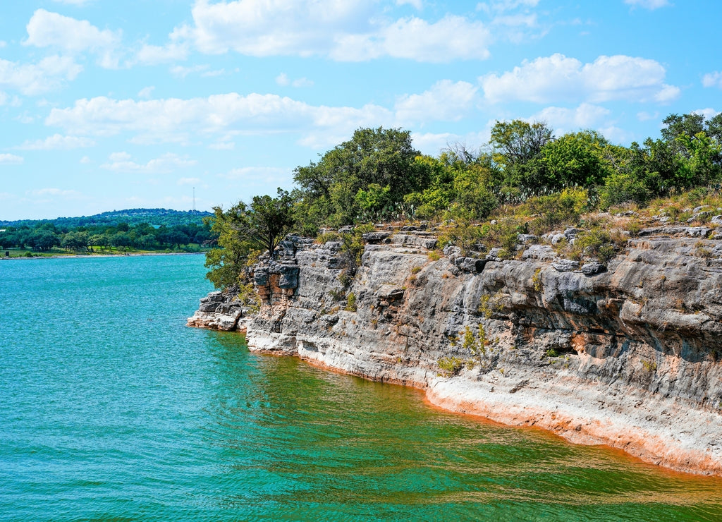 Lake Travis in Texas has some incredible cliffs on the edge of the lake to climb or jump into the water from