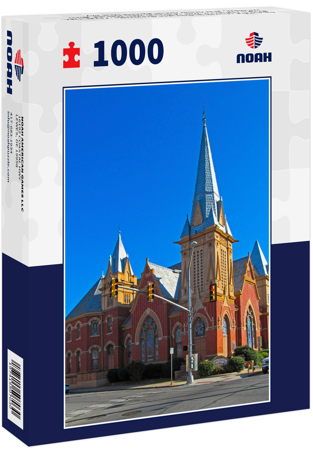 Beautiful church building in Greenville, Texas, USA. Bright red brick wall of house with stained-glass windows and decor detail against blue sky