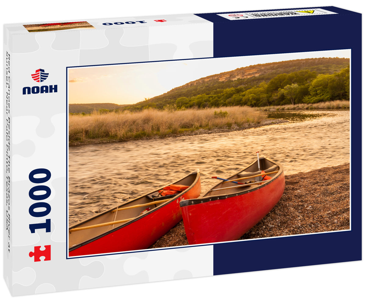 Red Canoes Beside The Brazos River at Sunset, Near Palo Pinto,Texas, USA