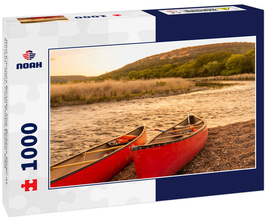 Red Canoes Beside The Brazos River at Sunset, Near Palo Pinto,Texas, USA