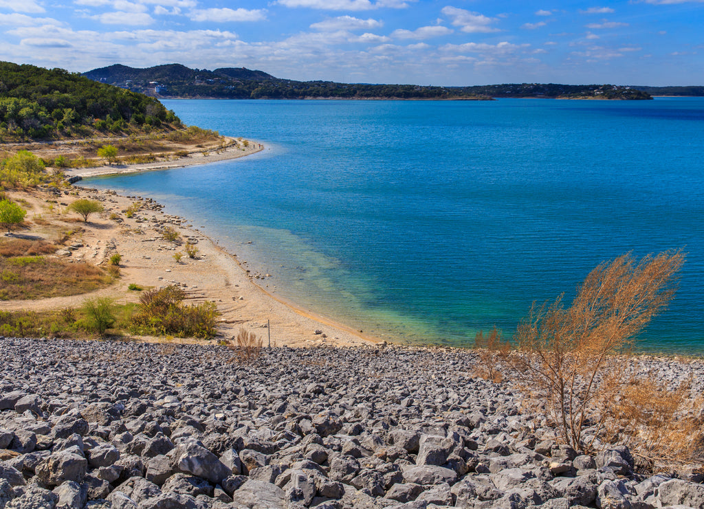 Canyon Lake close to San Antonio, New Braunfels, San Marcos and Wimberley in the Texas hill country. It is part of the Guadalupe River. You can walk on the dam. There are many beaches on the shores