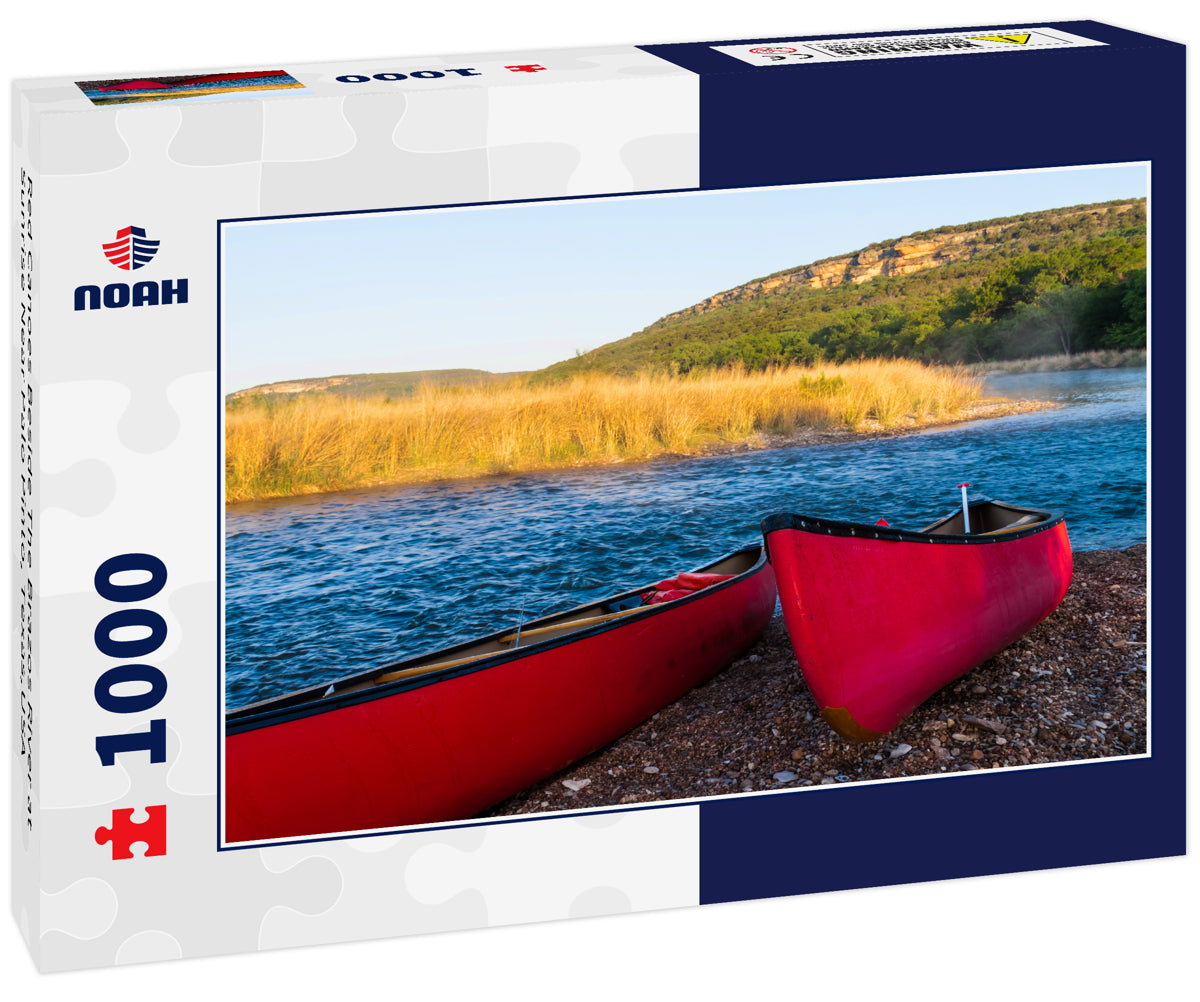 Red Canoes Beside The Brazos River at Sunrise Near Palo Pinto, Texas,USA