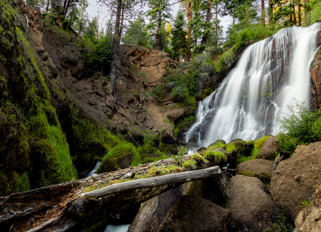 Mill Creek Falls in Modoc County, Northern California, USA. Shot from below the falls in late afternoon light at slow shutter