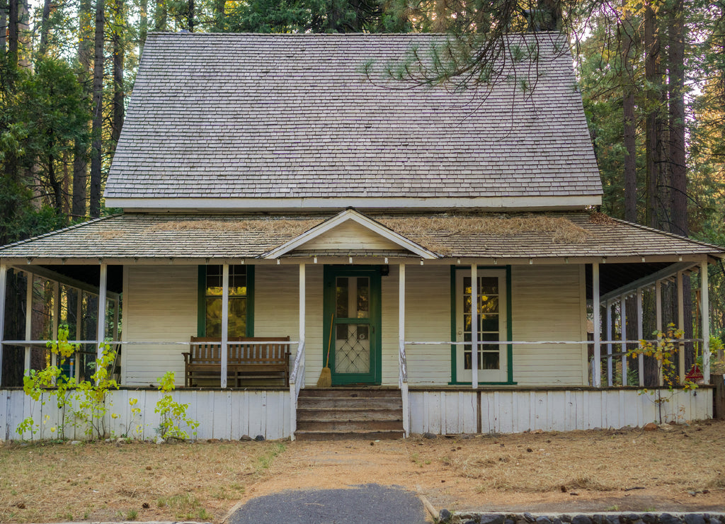 Old wooden house surrounded by trees used as Ranger Station, Calaveras Big Trees State Park, California