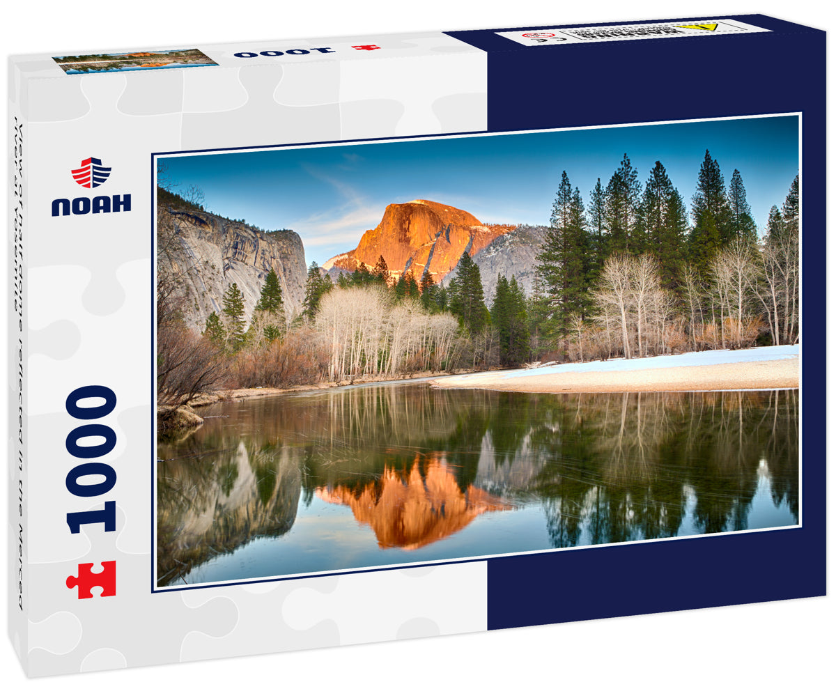 View of half dome reflected in the Merced river at Yosemite