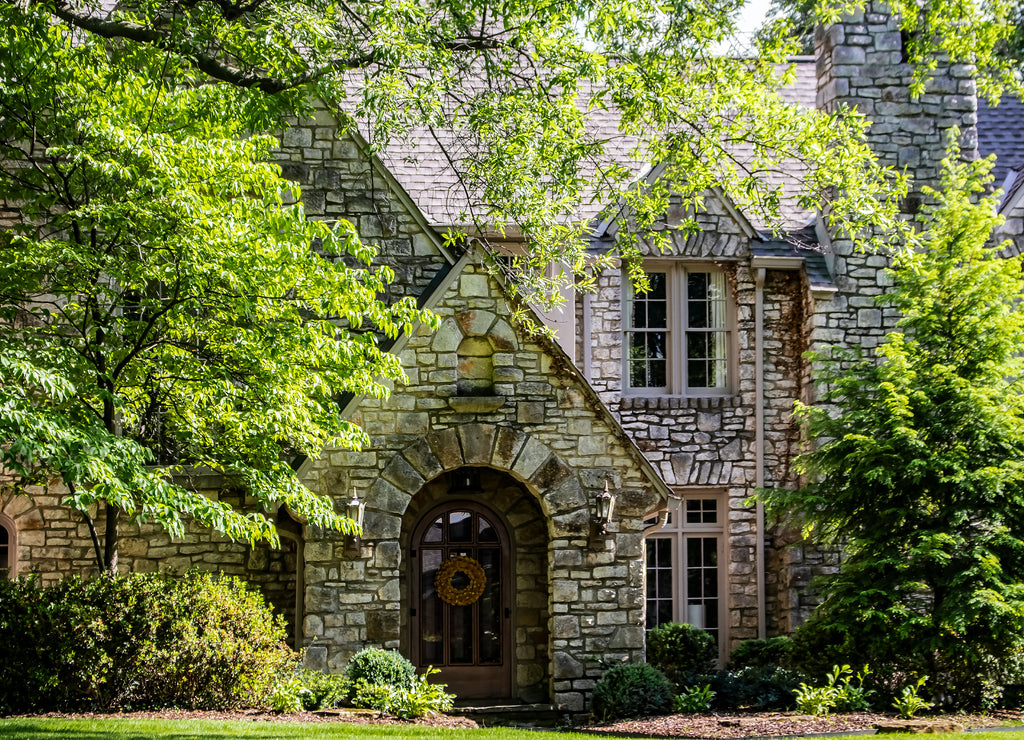 Entrance of upscale multi-gabled rock house, Oklahoma