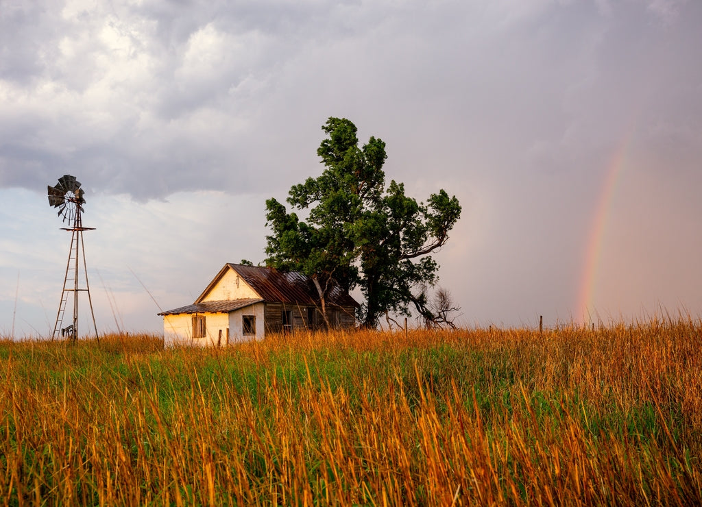 After the storm brings a colorful rainbow. Farmhouse Oklahoma