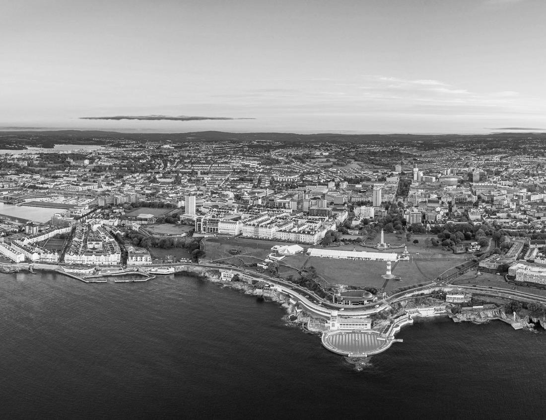 Noah Jigsaw Puzzle Historical building of a cotton factory with a clock tower in an old industrial park on Nashua River in May. Nashua, New Hampshire in black white 1000 pieces