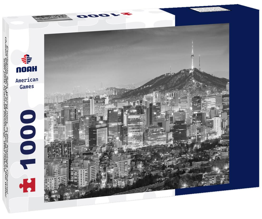 Noah Jigsaw Puzzle Elephants fight, young men, in the Kazinga Channel Queen Elizabeth NP in Uganda. Young men in the water with pink hyacinth blooming, wild nature. Wildlife Uganda. Elephant behavior in black white 1000 pieces