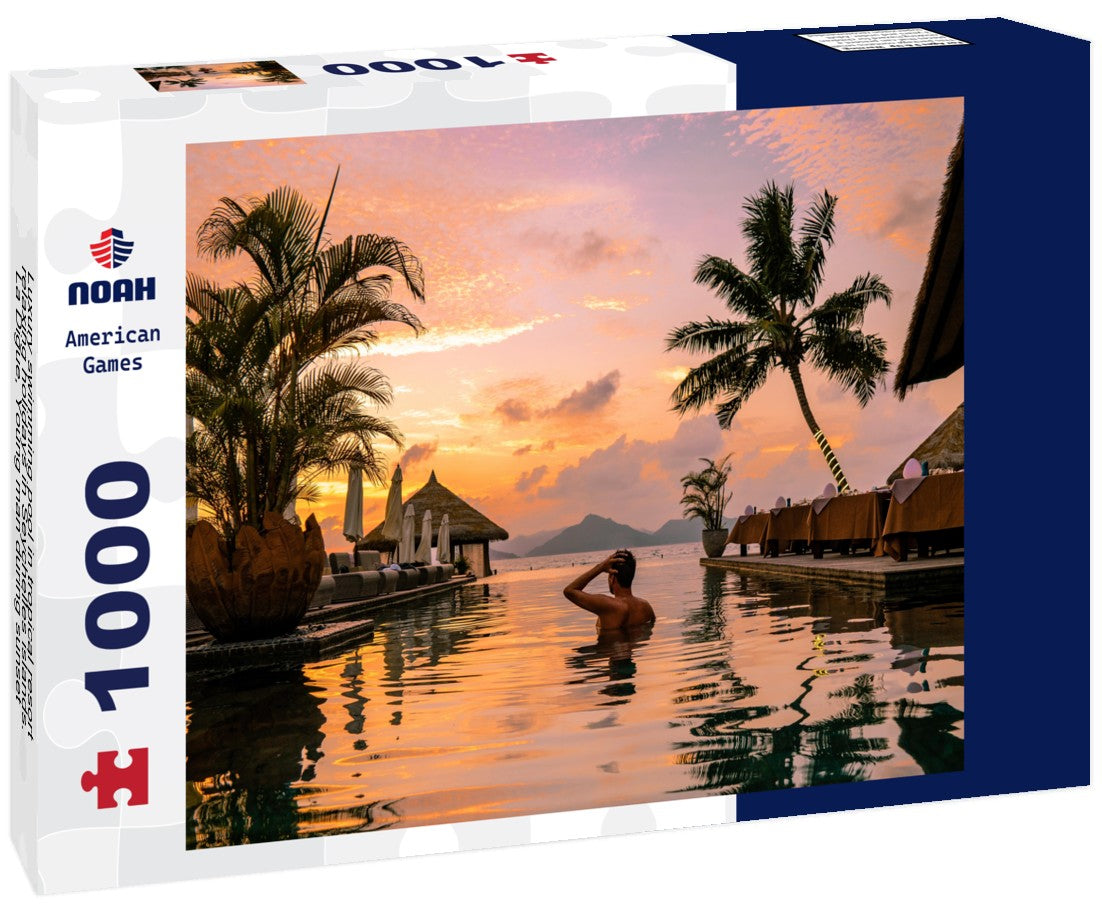 Noah Jigsaw Puzzle Luxury swimming pool in tropical resort, relaxing holidays in Seychelles islands. La Digue, Young man during sunset by swimpool Seychelles 1000 pieces