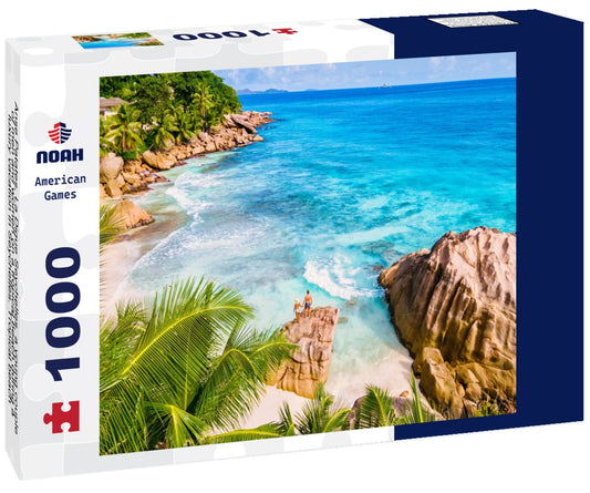 Noah Jigsaw Puzzle Anse Patates, La Digue Seychelles, a young couple of men and women on a tropical beach during a luxury vacation in Seychelles. Tropical beach Anse Patates, La Digue Seychelles 1000 pieces