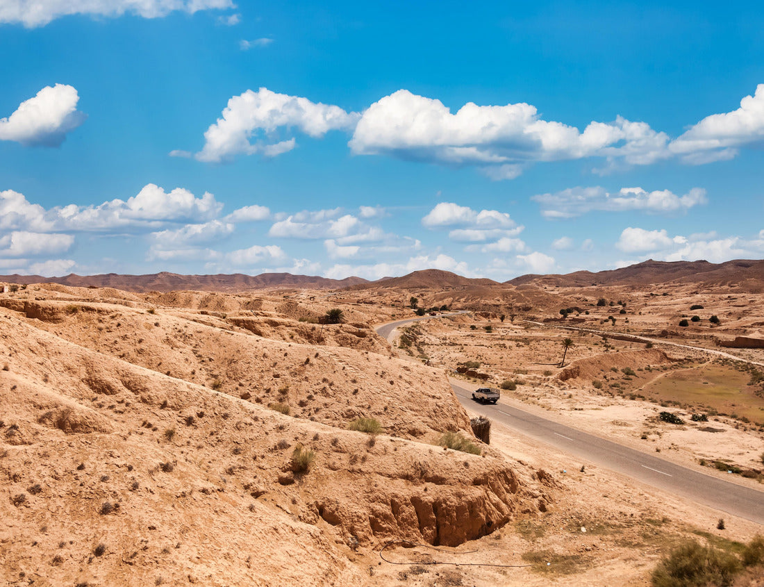 Noah Jigsaw Puzzle Landscape photography of the Sahara desert hills with sand dunes and road, vegetation and blue sky. View of the expanse of sandy desert summer sunny day, Sahara, Tozeur, Tunisia 1000 pieces