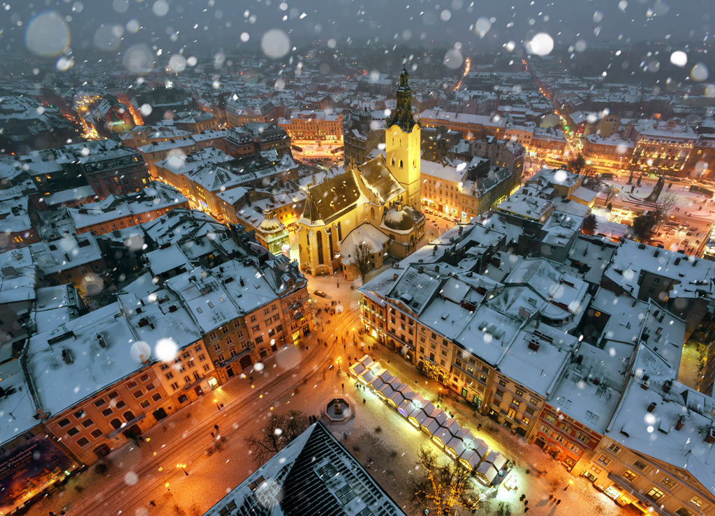 Lviv in winter time. Picturesque evening view on city center from top of town hall. Eastern Europe, Ukraine