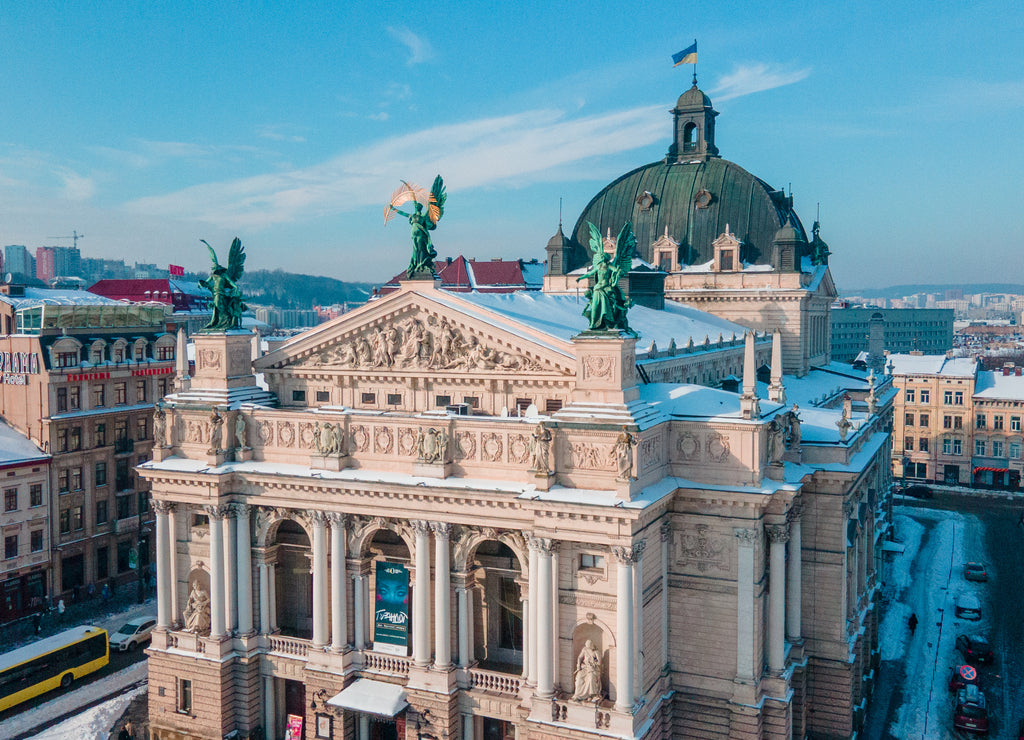 aerial view of city square in front of opera building in Lviv, sunny winter day