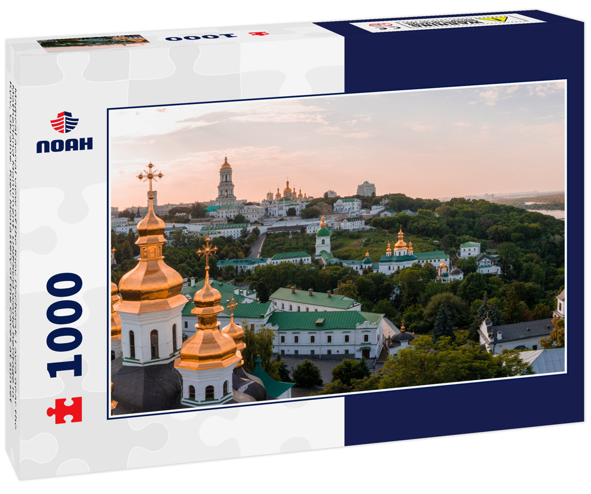 Magical aerial view of the Kiev Pechersk Lavra near the Motherland Monument. UNESCO world heritage in Kyiv, Ukraine. Kiev Monastery of the Caves at sunset