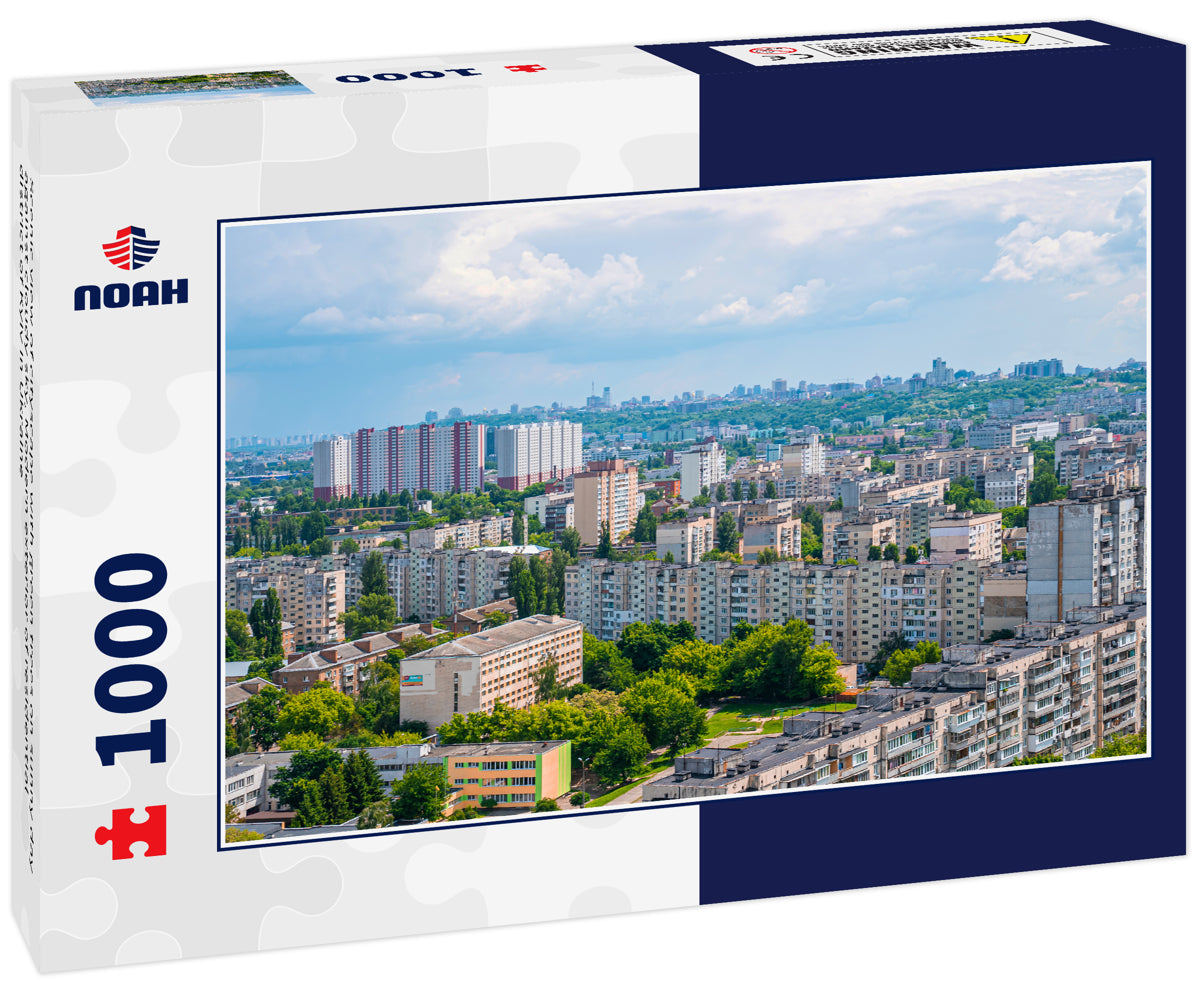 Scenic view of cityscape with green trees on sunny day against cloudy sky, Modern exterior of residential district of Kyiv in Ukraine