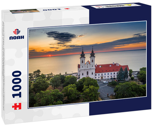 Tihany, Hungary - Aerial skyline view of the famous Benedictine Monastery of Tihany (Tihany Abbey) with beautiful colourful sky and clouds at sunrise over Lake Balaton