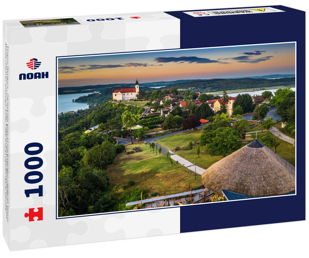 Tihany, Hungary - Panoramic view of the beautiful village of Tihany on the northern shore of Lake Balaton with the Benedictine Tihany Abbey (Tihanyi apatsag), Inner Lake and a colorful sky at sunrise