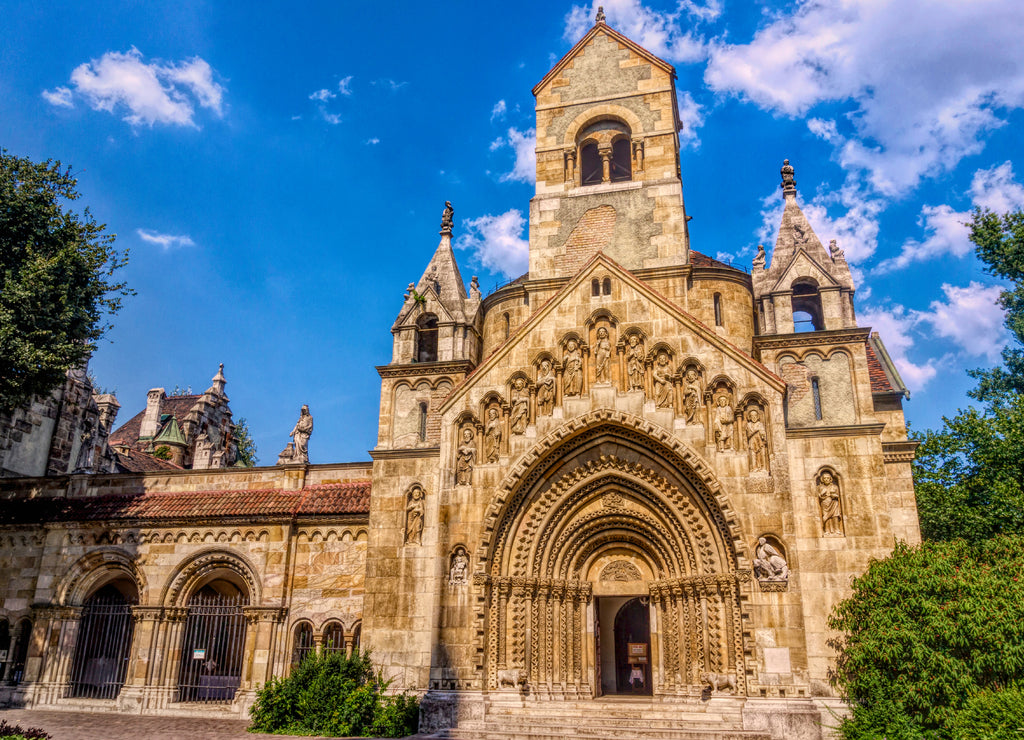 Ancient medieval gothic chapel in the sunny Varosliget park, Budapest, Hungary