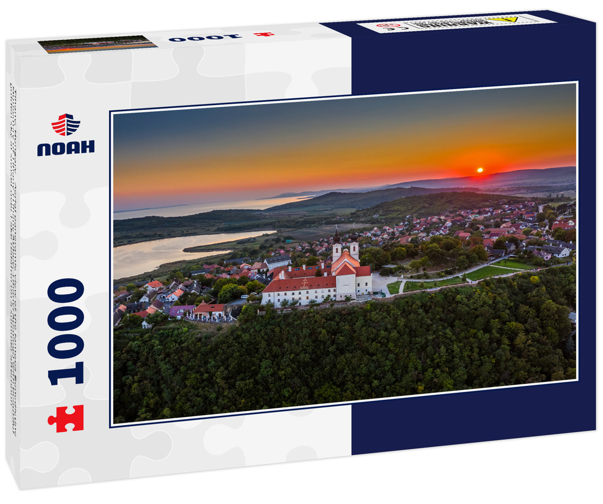 Tihany, Hungary - Aerial panoramic view of the famous Benedictine Monastery of Tihany (Tihany Abbey, Tihanyi Apatsag) with beautiful golden sky at sunset over Lake Balaton on a summer afternoon