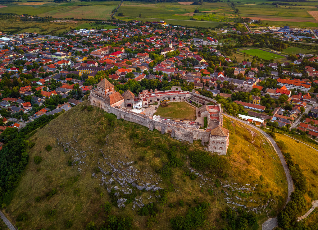 Sumeg, Hungary - Aerial view of the famous High Castle of Sumeg in Veszprem county on a summer afternoon with warm sunlight at sunset