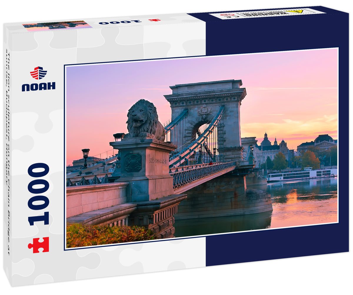 The lion sculpture on the Chain Bridge at sunrise, Budapest, Hungary