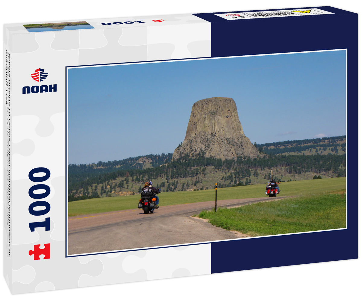 Bikers driving to Devils Tower National Monument at the Sturgis Motorcycle Rally in the Black Hills, Wyoming, USA