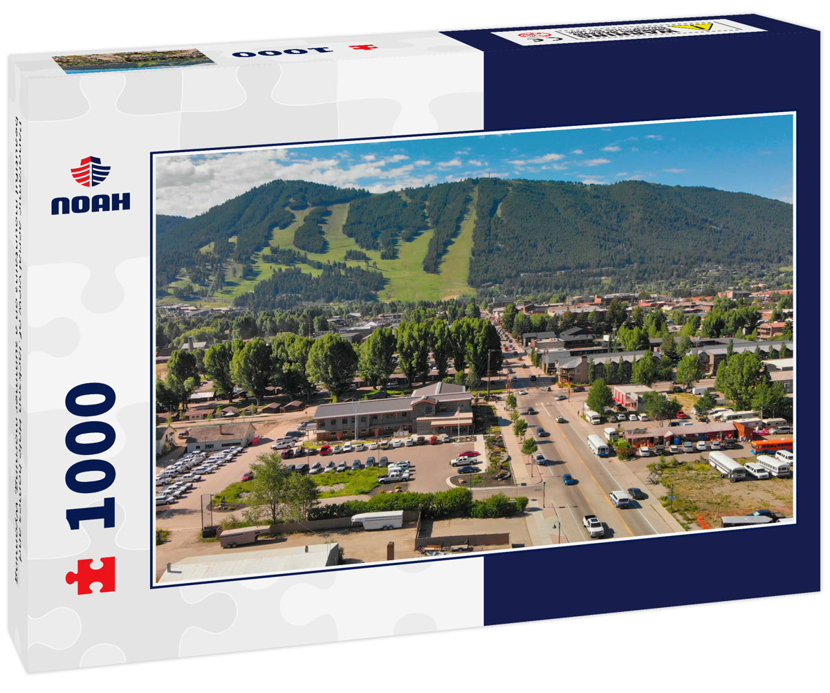 Panoramic aerial view of Jackson Hole homes and beautiful mountains on a summer morning, Wyoming