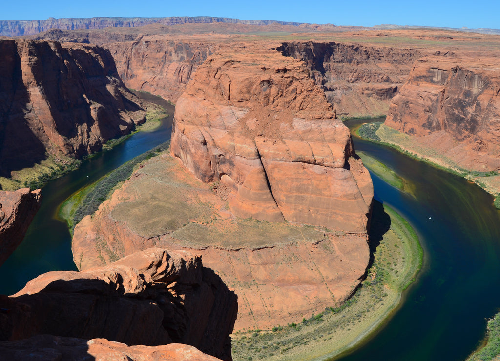 Beautiful horseshoe bend on a sunny day, Page, Arizona, USA