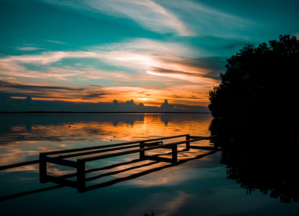 View of a sunset from the port of Ologa´, on the eastern shore of Lake Maracaibo, Venezuela