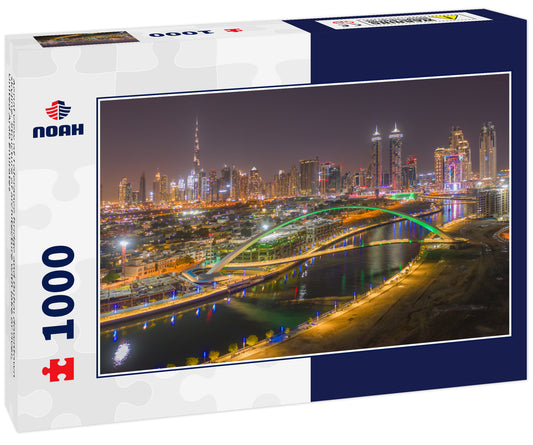 Aerial view of Tolerance bridge and Dubai downtown skyline. Structure of architecture with lake or river, United Arab Emirates