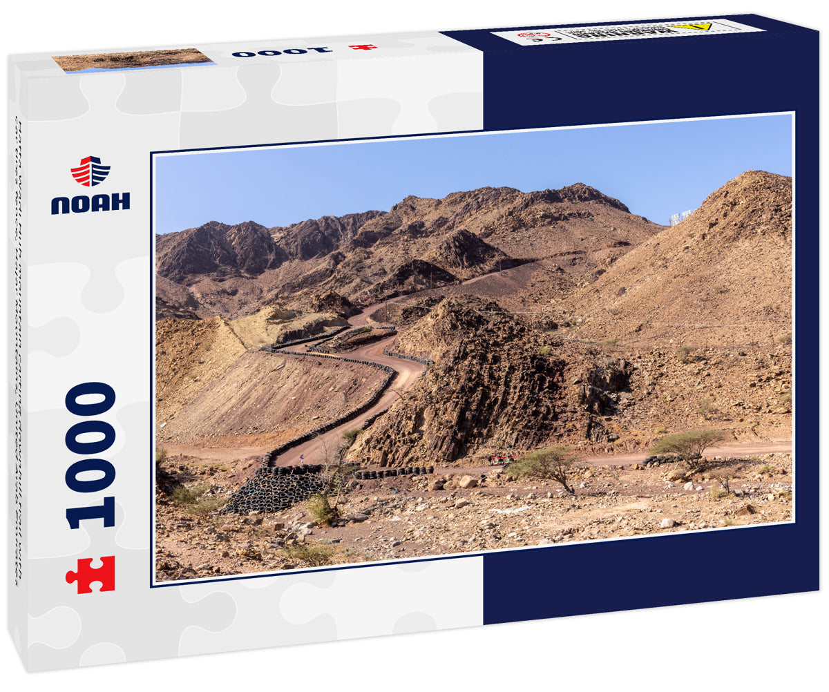 Hatta Wadi Hub mountain carting downhill trail with car tires fence, Hajar Mountains, United Arab Emirates