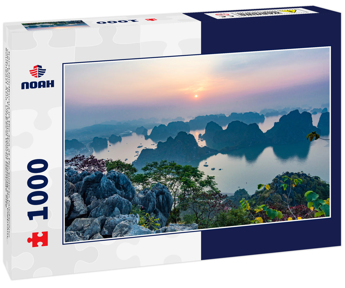 Karst landforms in the sea at the sunrise landscape view from Bai Tho Mountain in Halong Bay, Vietnam, Southeast Asia. UNESCO World Heritage Site