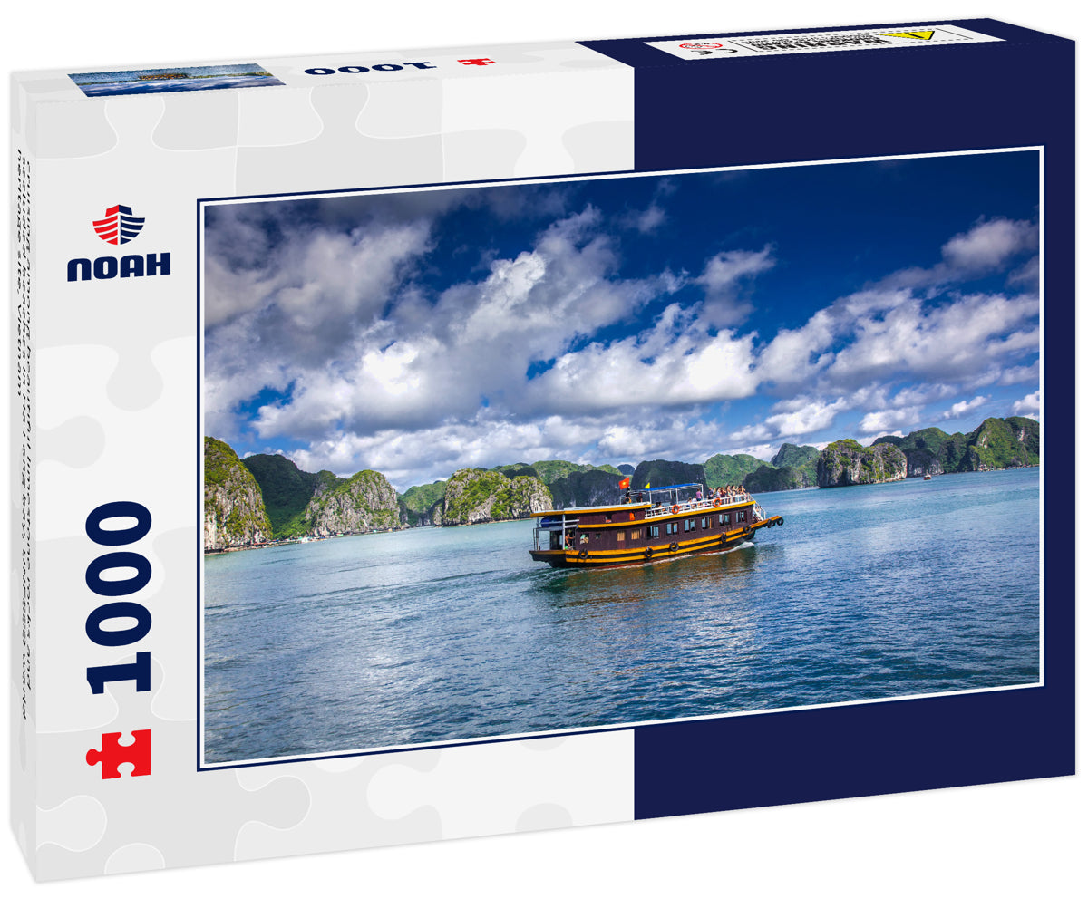 cruising among beautiful limestone rocks and secluded beaches in Ha Long bay, UNESCO world heritage site, Vietnam