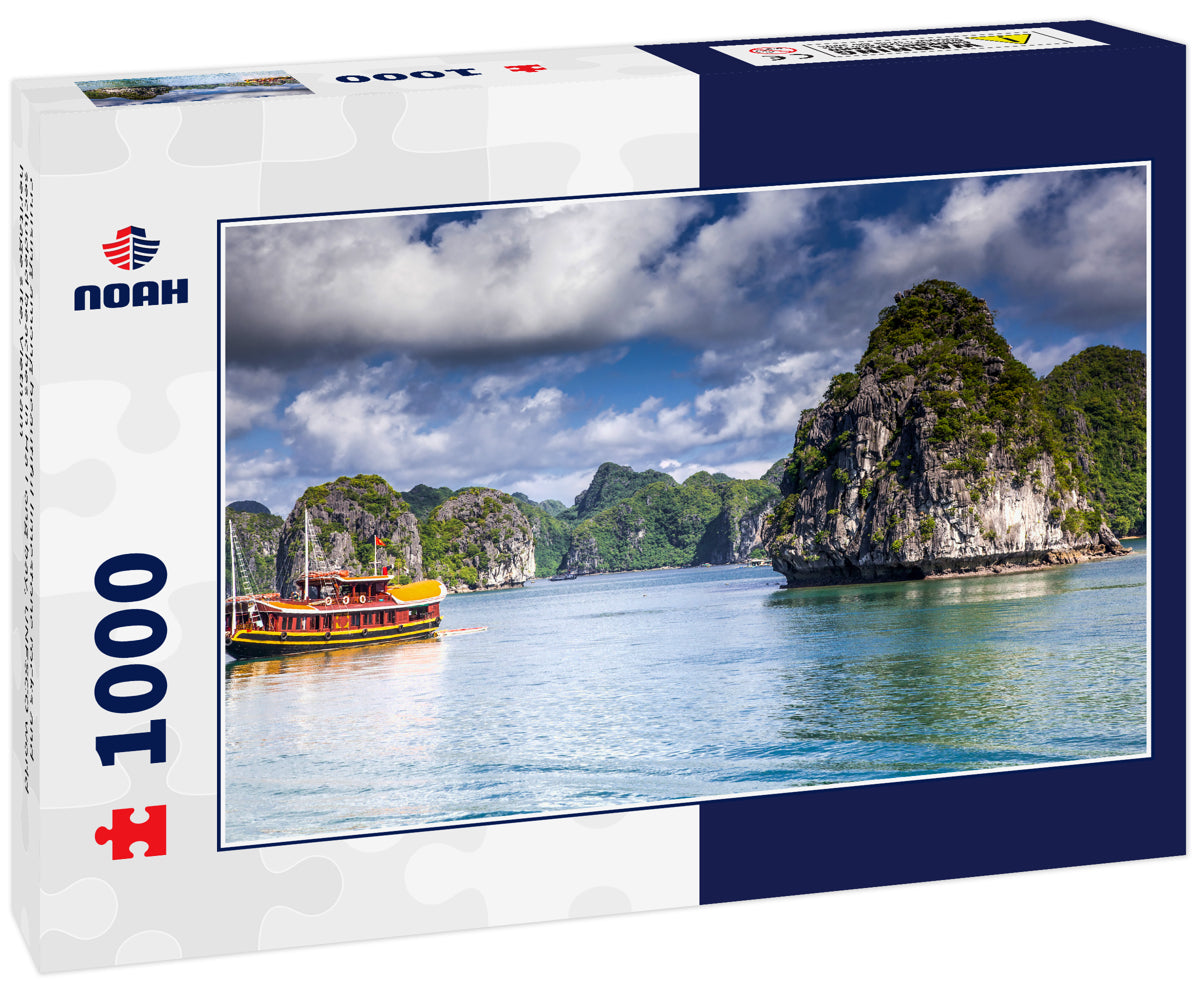 cruising among beautiful limestone rocks and secluded beaches in Ha Long bay, UNESCO world heritage site, Vietnam