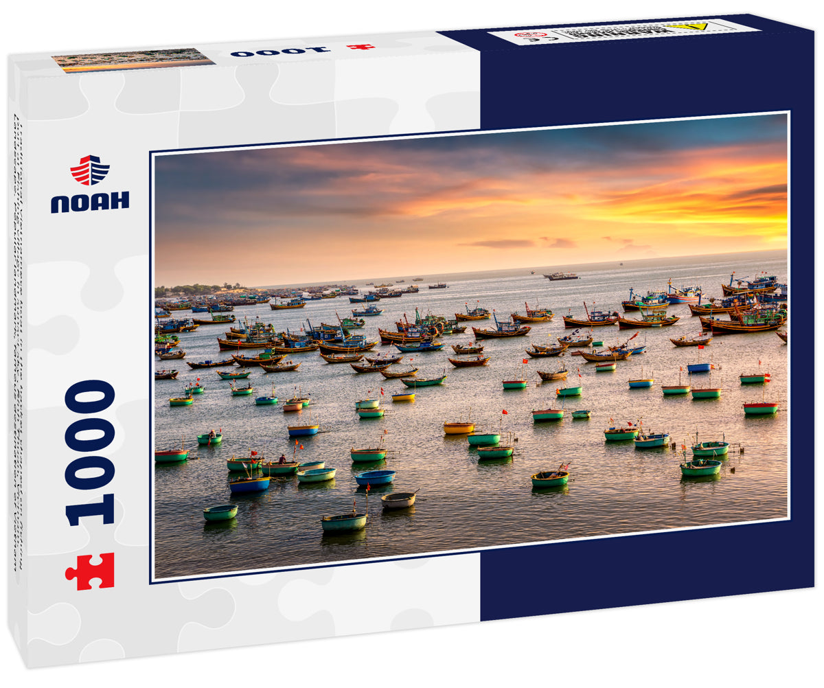 Traditional Vietnamese boat in the basket shaped on fishing port at Fishing village in sunset sky , Binh Thuan, Vietnam. Landscape. Popular landmark, famous destination of Vietnam