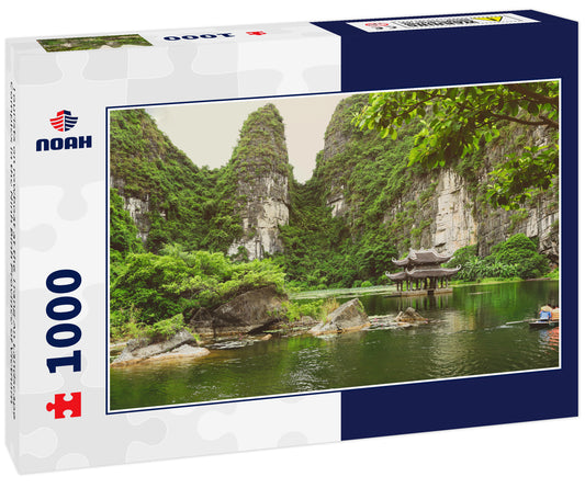 Tourists on rowboat at the Trang An Landscape Complex in the Ninh Binh Province of Vietnam