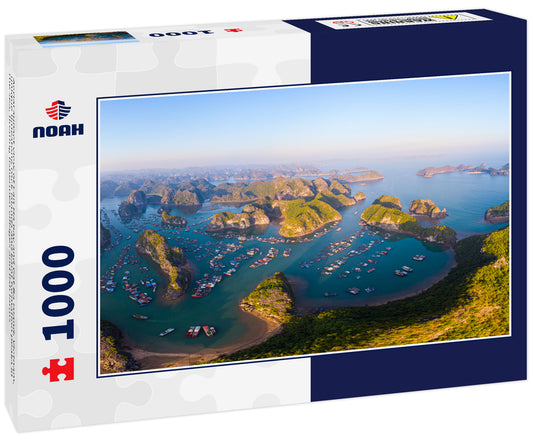 Aerial sunset view of Lan Ha bay and Cat Ba island, Vietnam, unique limestone rock islands and karst formation peaks in the sea, floating fishermen villages and fish farms