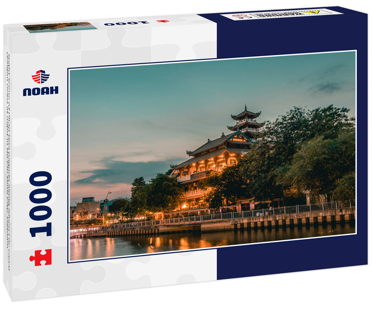 Night scene of Phap Hoa pagoda along Nhieu Loc canal (Saigon river) at night in Ho Chi Minh City, Vietnam