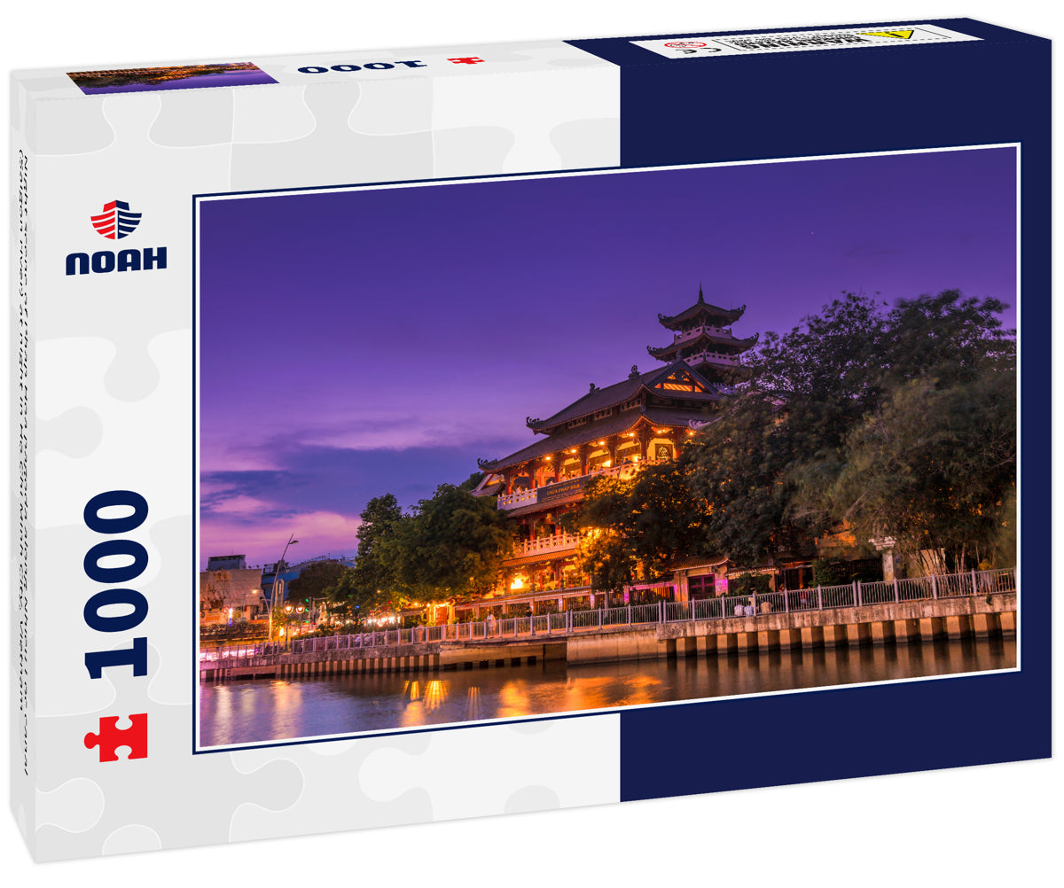 Night scene of Phap Hoa pagoda along Nhieu Loc canal (Saigon river) at night in Ho Chi Minh City, Vietnam
